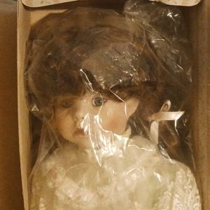 A connoisseur collection porcelain doll Maureen